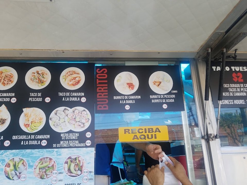 Menu-style spread of ceviche and aguachile.